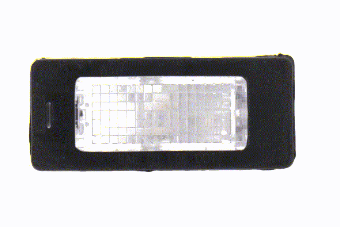 VEMO 1032765 Éclairage de plaque d'immatriculation